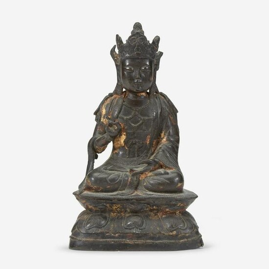 A Chinese lacquered bronze figure of Guanyin 铜