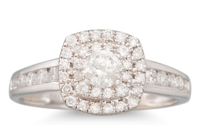A DIAMOND CLUSTER RING, the round brilliant cut diamond to a...