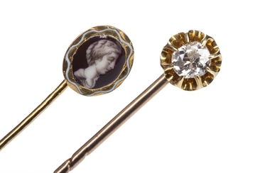 A DIAMOND SET PIN AND A PORTRAIT PIN
