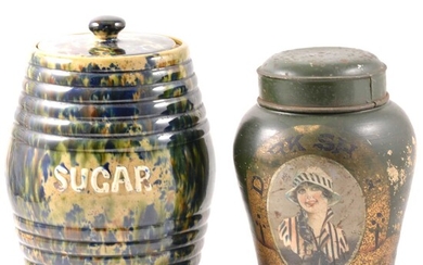 A Dark Shag stoneware shop tobacco jar with tin lid and a majolica glaze sugar jar.