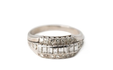 A Diamond White Gold Band Ring A diamond ring with a sequen...