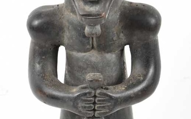 A Fang, Gabon, standing figure presented on a contemporary plinth...