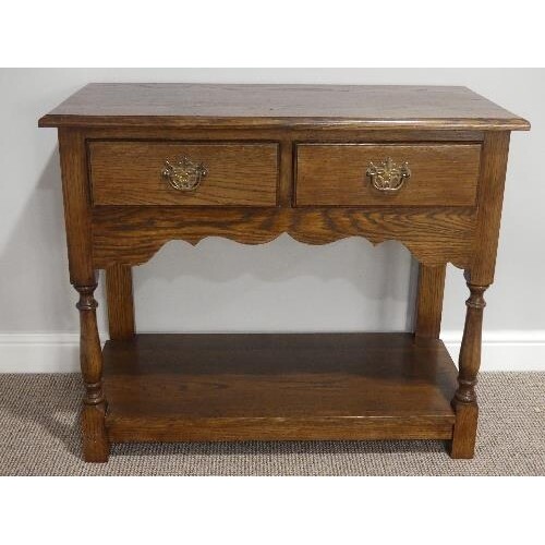 A George III style oak Side Table, with two drawers, turned ...