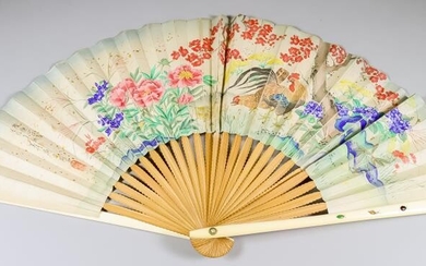 A Japanese Fan, Meiji Period, the ivory guard-sticks inlaid...