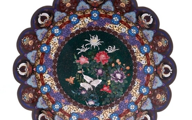 A LARGE SCALLOPED PLATE