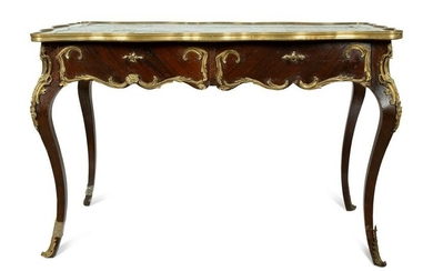 A Louis XV Style Gilt Bronze Mounted and Leather Inset