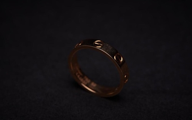 A MINI LOVE RING BY CARTIER - Styled in 18ct rose gold, size J.