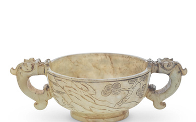 A MOTTLED GREEN AND RUSSET JADE TWO-HANDLED CUP Qing Dynasty