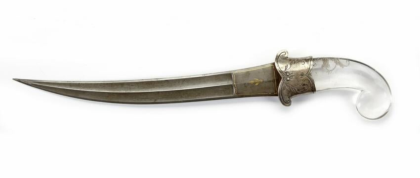 A MUGHAL ROCK-CRYSTAL HILTED WATERED-STEEL DAGGER