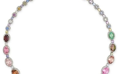 A MULTICOLOURED GEMSTONE AND DIAMOND RIVIERE NECKLACE in 18ct white gold, set with oval mixed cut