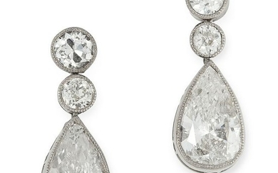 A PAIR OF DIAMOND DROP EARRINGS each set with a