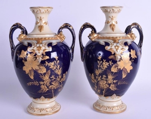 A PAIR OF FRENCH LIMOGES PORCELAIN VASES decorated with