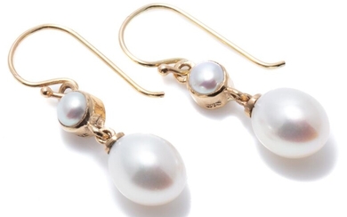 A PAIR OF FRESHWATER CULTURED PEARL DROP EARRINGS; 7 x 8.2mm oval pearls to 9ct gold collet set river pearls on shepherds hook fitti...