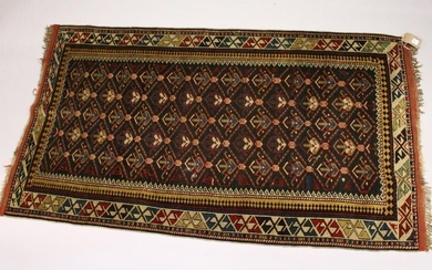 A PERSIAN CAUCASIAN RUG, EARLY 20TH CENTURY, black