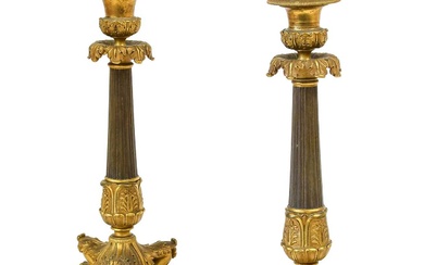 A Pair of Bronze Candlesticks, in Louis XVI style, with...