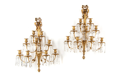 A Pair of Louis XVI Style Gilt Bronze and Cut Glass Nine-Light Sconces
