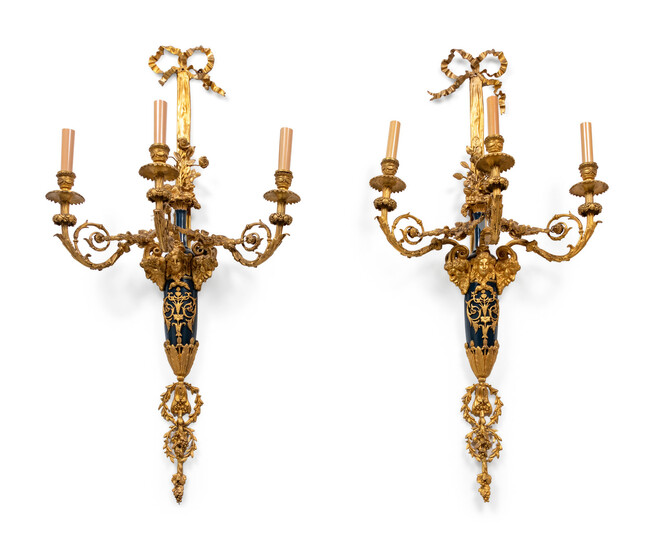 A Pair of Louis XVI Style Part Ebonized and Gilt-Bronze Three-Light Sconces