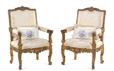 A Pair of Regence Style Carved Giltwood Fauteuils