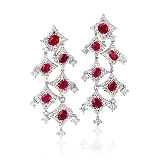 A Pair of Ruby, Diamond, and Bi-Colored Gold Earrings