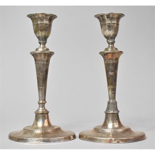 A Pair of Silver Candlesticks on Oval Bases, 18cm high