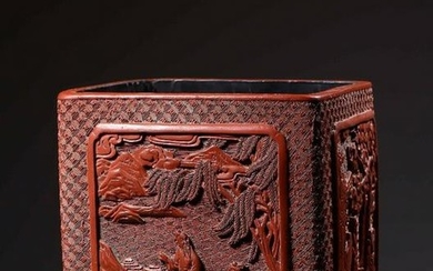 A RED LACQUER BRUSH POT CARVED FIGURE STORY PATTERN