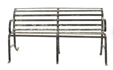 A REGENCY PAINTED CAST IRON GARDEN BENCH with scrolled...