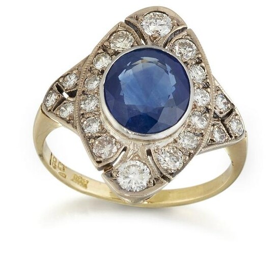 A SAPPHIRE AND DIAMOND CLUSTER RING, an oval-cut