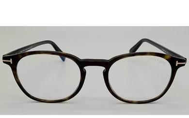 A TOM FORD pair of glasses.