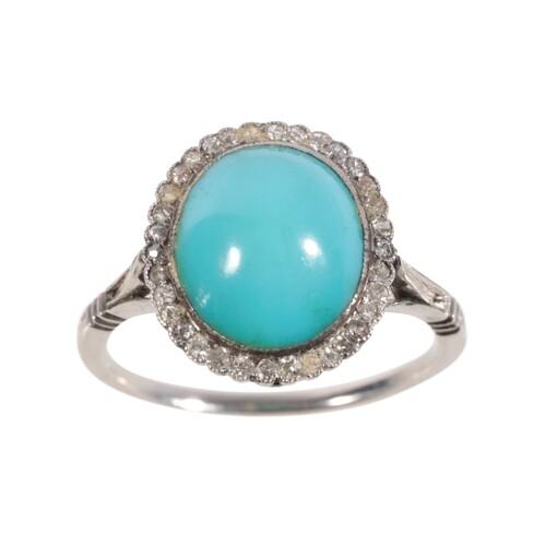 A TURQUOISE AND DIAMOND DRESS RING the turquoise, within a b...