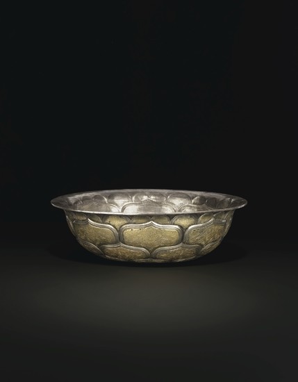 A VERY RARE AND IMPORTANT LARGE PARCEL-GILT SILVER BOWL, TANG DYNASTY (AD 618-907)
