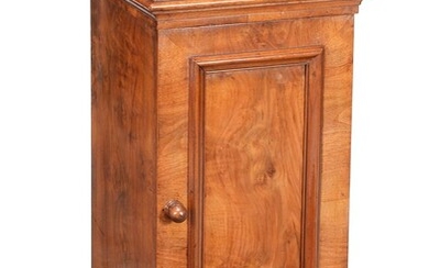 A Victorian figured walnut pedestal cupboard