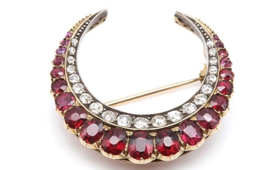 A Victorian ruby and diamond closed crescent brooch, c.1890