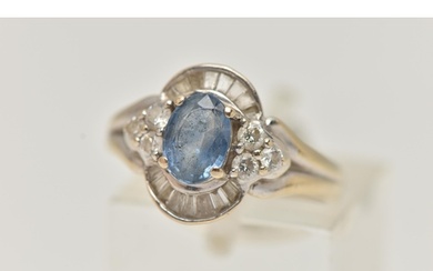 A WHITE METAL SAPPHIRE AND DIAMOND RING, set with an oval cu...