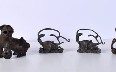 A collection of Chinese bronze items Foo dog, dragons and Turtles 9 x `13 cm.
