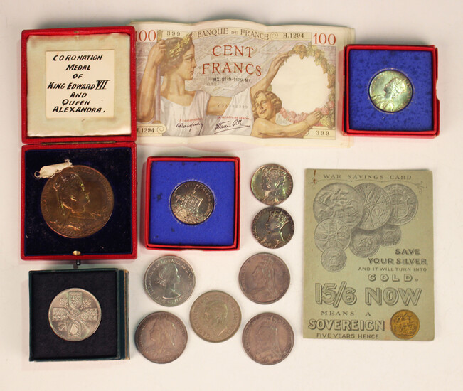 A collection of coins and commemorative medals, including a Victoria Old Head crown 1895, two Victor