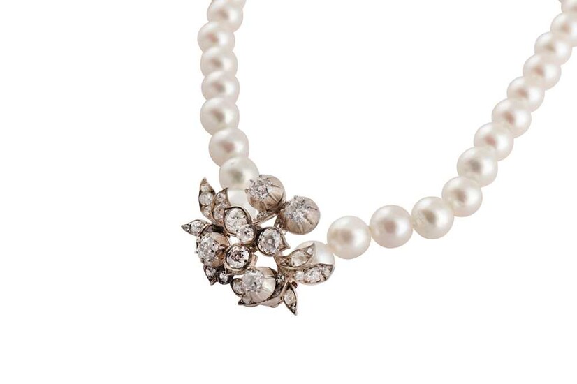 A cultured pearl necklace with a diamond spacer