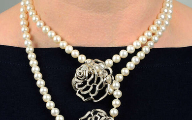 A cultured pearl two-strand necklace, with brilliant-cut diamond openwork rose clasp terminals.