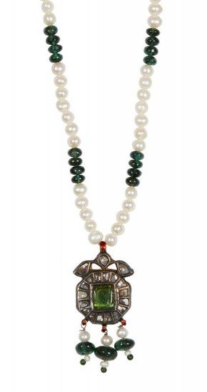 A diamond and carved emerald pendant necklace,...