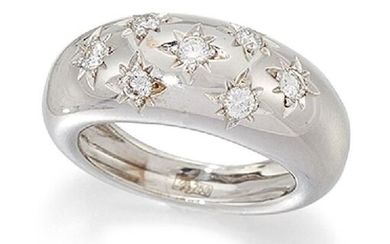 A diamond gypsy-set ring, the seven brilliant-cut diamonds...