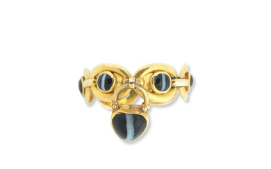 A gold and sardonyx ring with charm, circa 1860