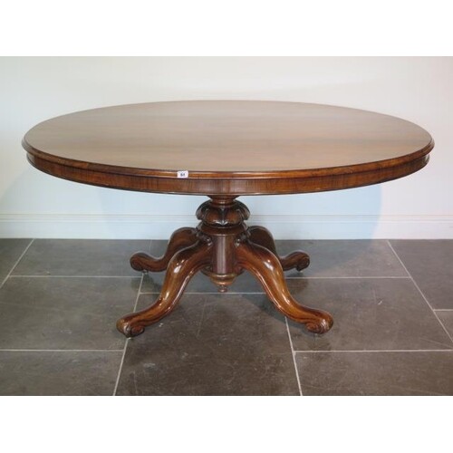 A good 19th century rosewood breakfast table with an oval 15...