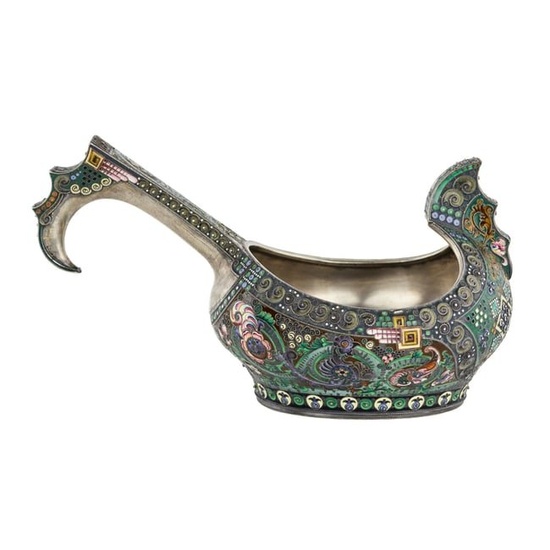 A graceful silver kovsh in the Russian Art Nouveau style of the 11th Moscow artel. Early 20th