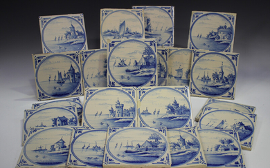 A group of approximately sixty Dutch Delft blue and white tiles, late 19th/early 20th century, each
