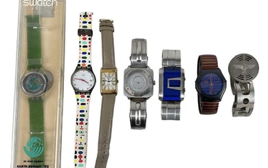 A group of gentleman's fashion wristwatches including Swatch, two Storm...