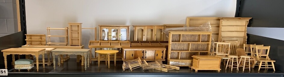 A large quantity of dolls house wooden furniture.