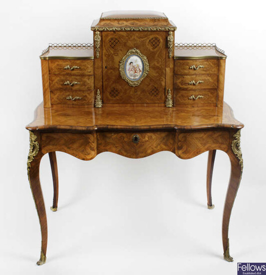 A late 19th century French satinwood and marquetry inlaid bonheur du jour.