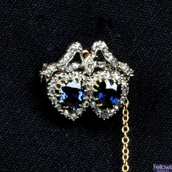 A late Victorian silver and gold, blue spinel and rose-cut diamond double heart brooch.