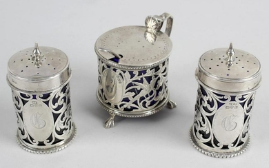 A matched Edwardian silver condiment set, comprising a