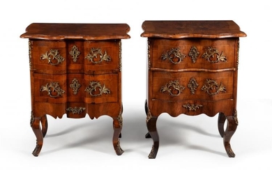A matched pair of Continental walnut commodes, late 18th/early 19th century