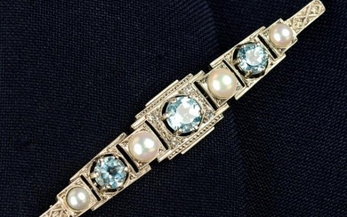 A mid 20th century palladium and gold, blue topaz, cultured pearl and diamond geometric bar